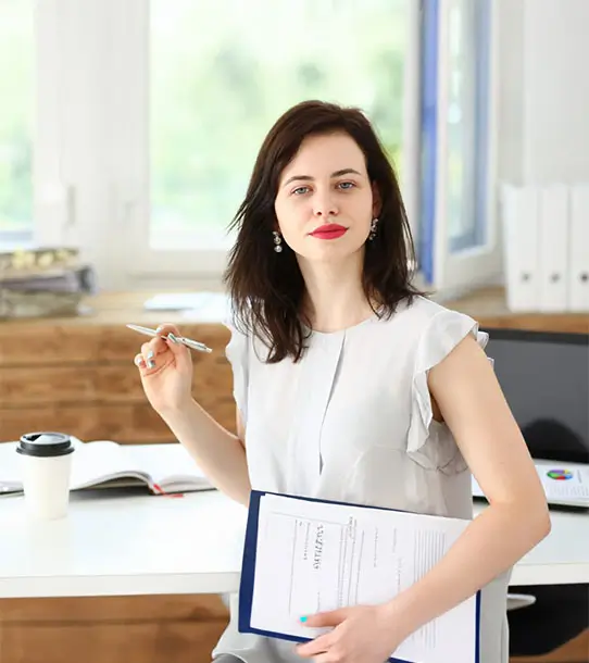 Beautiful smiling businesswoman portrait at workplace look in camera.